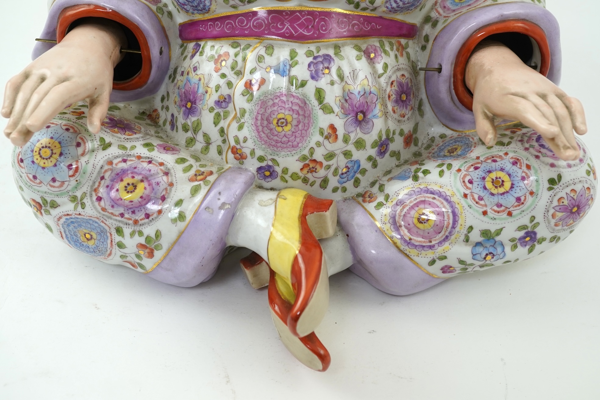 A large Continental porcelain figure of a seated nodding Buddha, early 20th century